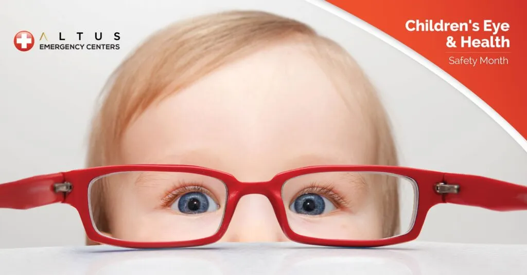 child in front of red eyeglasses
