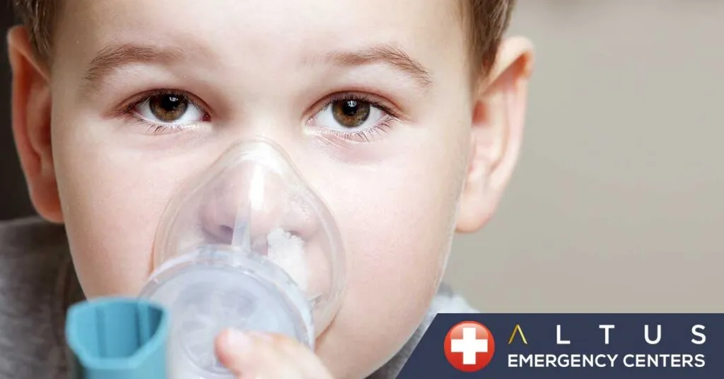 baby boy with an oxygen mask