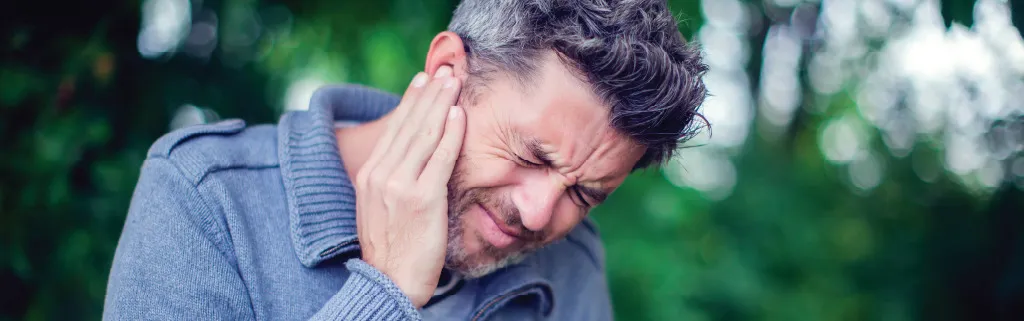 Man with severe ear pain