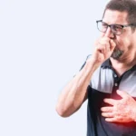 Older man coughing with bronchitis chest pain