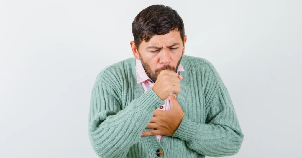 Man suffering from a severe whooping cough