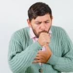 Man suffering from a severe whooping cough